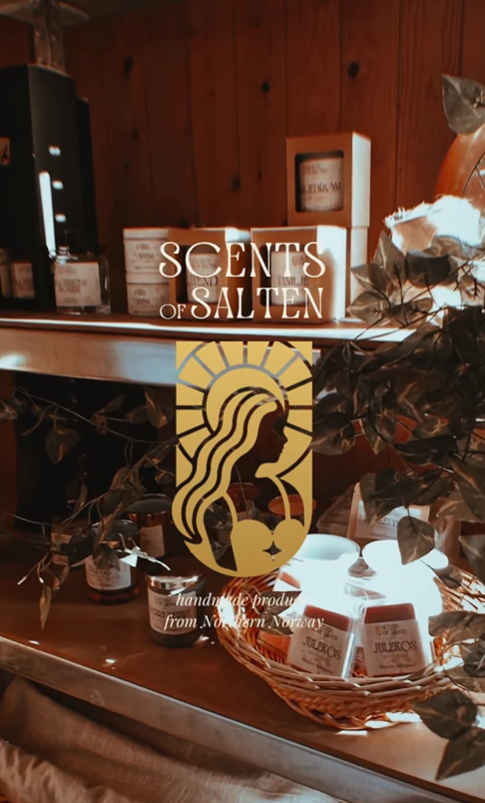 Scents of Salten logo on a shelf with products and plants